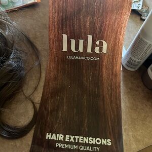 Lula Halo hair extensions light brown. Never worn, opened package